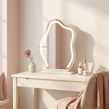 Freya Cloud Mirror lit on a vanity desk (props not included)