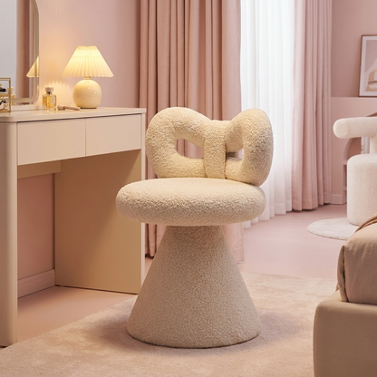 Petra Bow Vanity Stool lit at night (props not included)