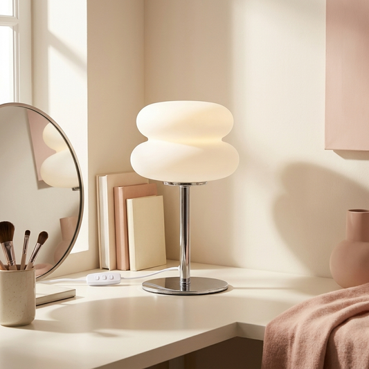 Pippa Vanity Lamp lit on a vanity table